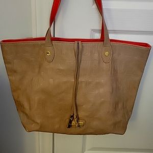 Steve Madden tote. Tan with orange interior. Satchel style.